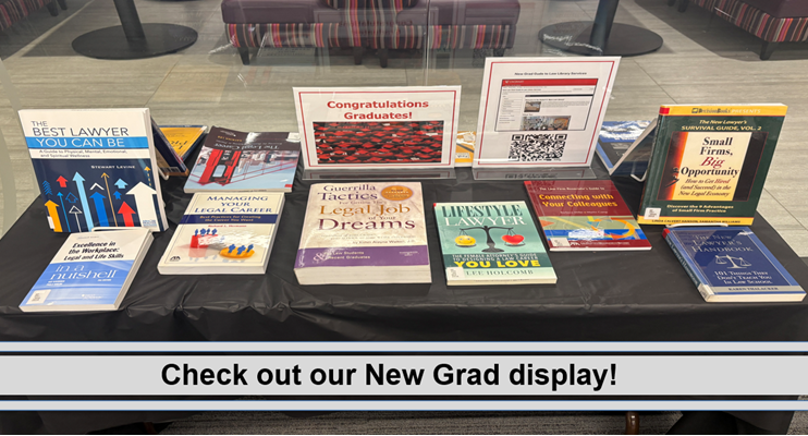 New Grad Display featuring link to New Grad Guide and books on legal careers