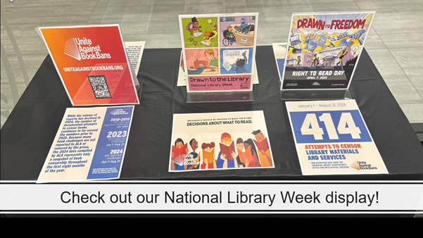 National Library Week display featuring posters, and banned books statistics