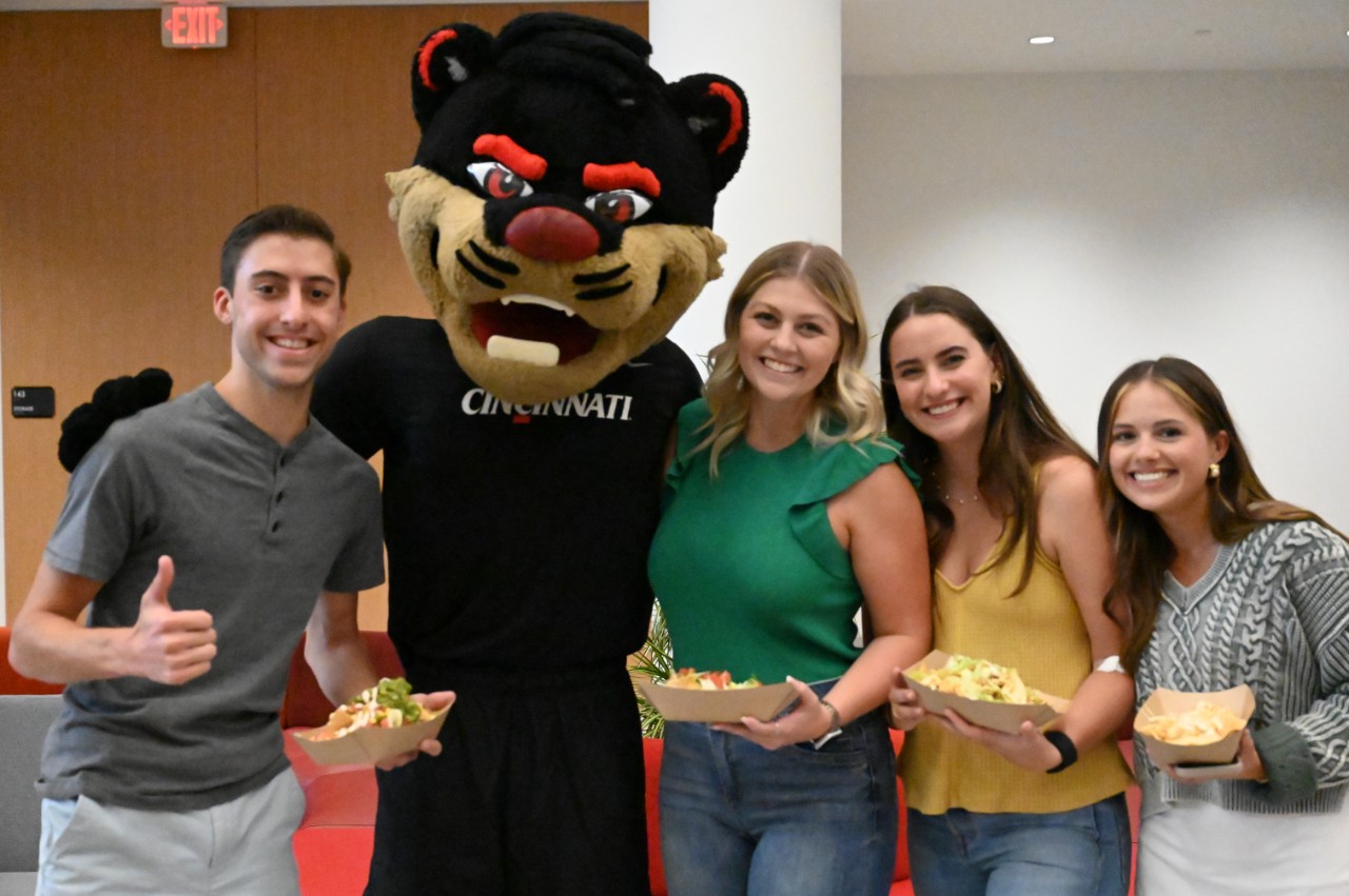 Guests listen to the speaker in the new atrium